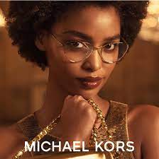 Woman Wearing Michael Kore Eyeglasses